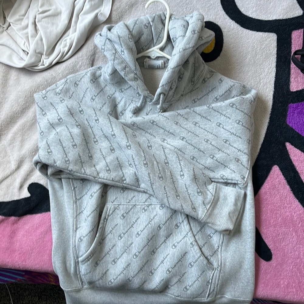 I’m selling this grey champion hoodie it’s a kids 12/14